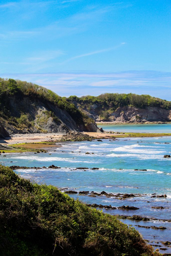 Explore the serene and picturesque coastline of Hendaye, capturing the rugged cliffs and turquoise waters.
